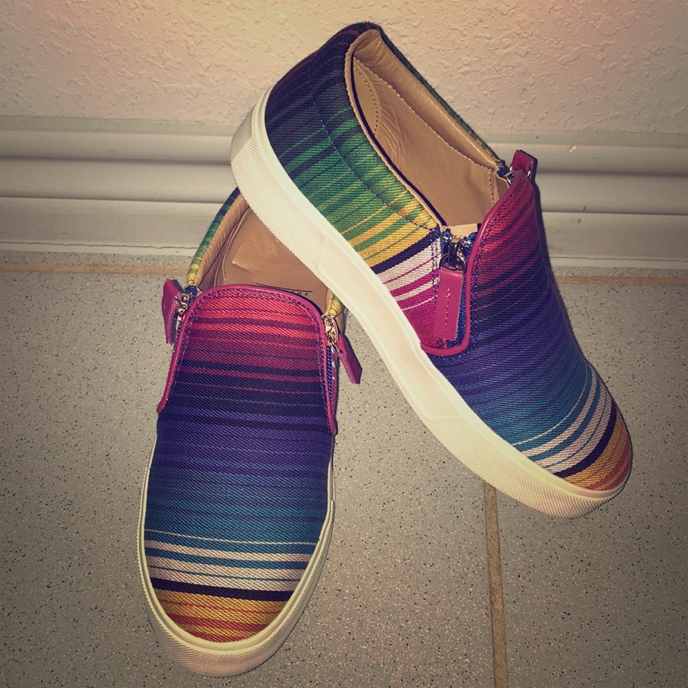 Rainbow-colored Volatile Slip On Sneakers.
